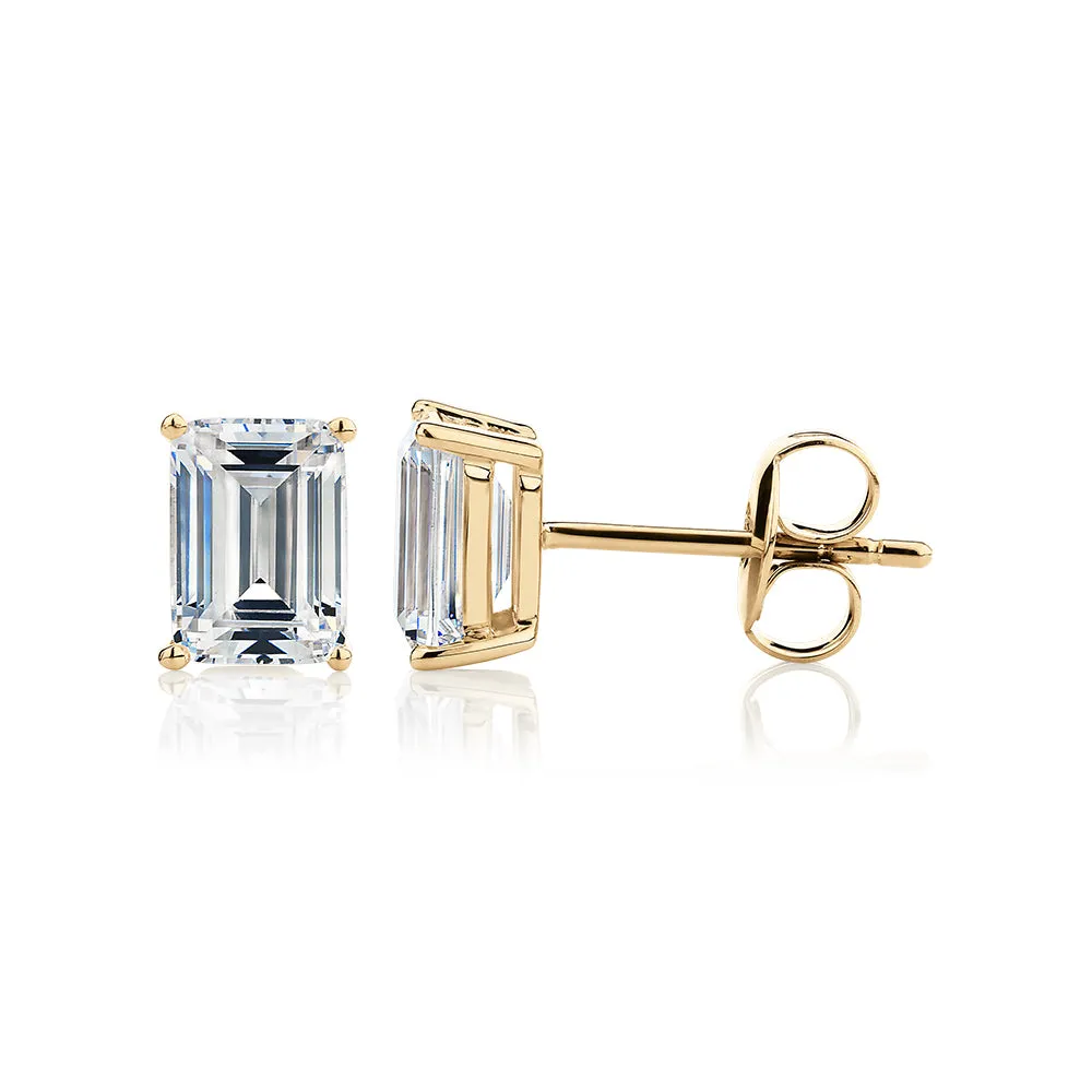 Emerald Cut stud earrings with 2 carats* of diamond simulants in 10 carat yellow gold